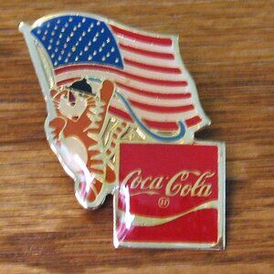 Coca-Cola lapel pin with American flag and tiger